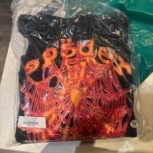 Black Performance Jacket with Red-Orange Graphic